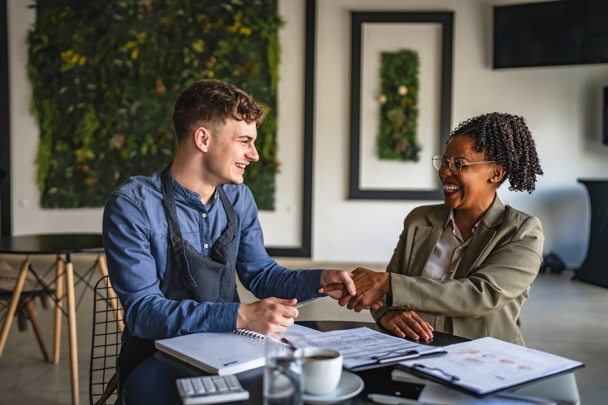 Business mentorship handshake partnership professional